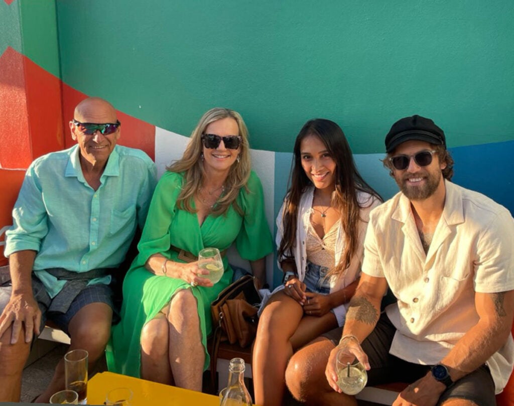 a group of people sitting next to each other.