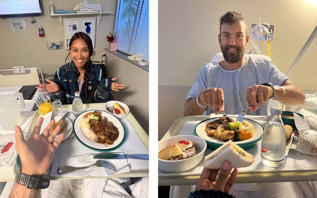 a man and a woman sitting at a table with plates of food.