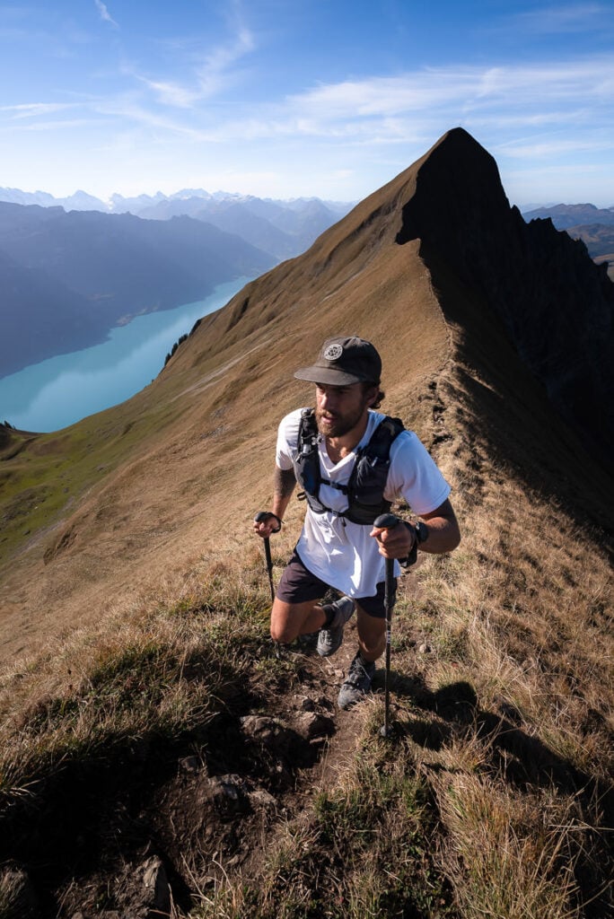 a man hiking up the side of a mountain