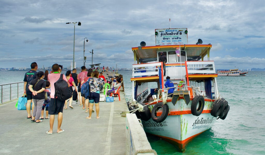 a boat docked at a pier.