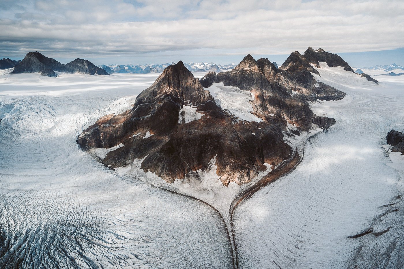 an aerial view of a large mountain range.