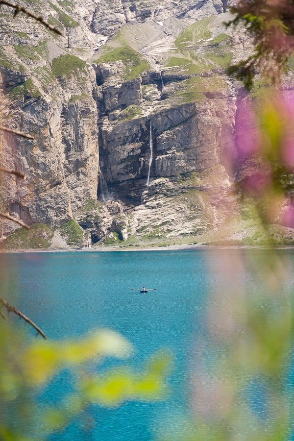 a boat in the middle of a large body of water.