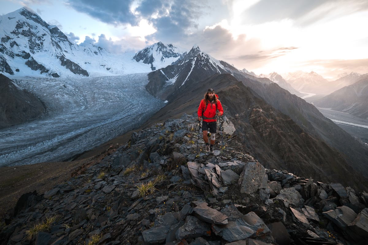 a man standing on top of a rocky mountain