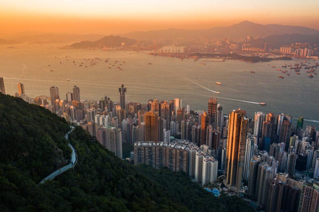 a view of a city from the top of a mountain.