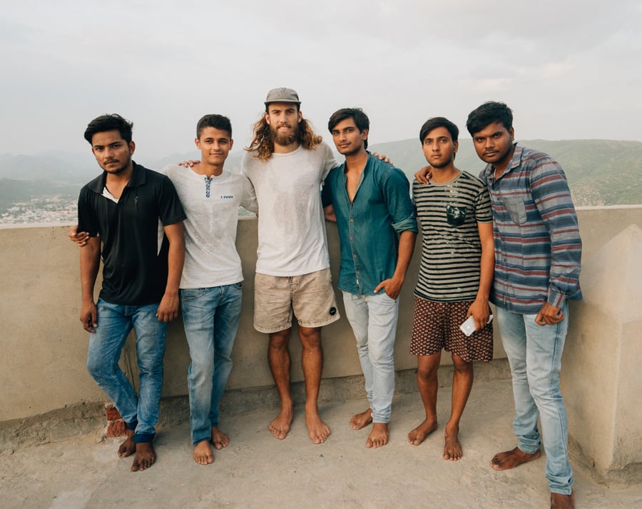 a group of men standing next to each other.